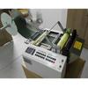Máquina de corte e estampagem de saco plástico de PVC máquina de corte de comprimento fixo de material de tira máquina de corte de computador não tecido