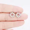 Pendientes de acero de titanio 316L joyería de moda forma de engranaje tres colores opcionales fábrica en stock suministro transfronterizo de Amazon