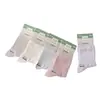 Calcetines deportivos Wanzhid 1818 para mujer, nuevo modelo de otoño e invierno, hechos de algodón peinado, punta sin costuras, color liso, calcetines de cintura media para mujer, disponibles para venta al por mayor