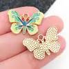 Mezcla 20 gotas de aceite simulación dos colores degradado colgante de mariposa creativo DIY accesorios para joyería con cuentas fabricantes al por mayor