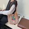Bolso de playa grande tipo ins de color caqui para mujer, bolso de hombro de punto hueco de lana 2025 para vacaciones