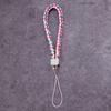 Venta al por mayor de fábrica cordón para teléfono móvil de cuero PU cuero llavero para cámara cordón para pareja correa de muñeca para teléfono móvil cuerda trenzada de cuero