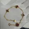 V oro versión alta L familia burro rombo pulsera redonda cuatro flores nácar blanco nácar rosa fábrica de origen transmisión en vivo llevar mercancía