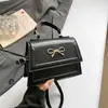 Bolso de Mano Retro de Moda Transfronterizo 2026 Nuevo Versátil Elegante Pequeño Cuadrado para Viajar Bolso Cruzado de Hombro Casual
