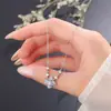 Collar de plata pura 999 con trébol de cuatro hojas azul hielo para mujer, cadena para la clavícula de diseño exquisito, versátil y moderno, regalo perfecto para novia