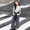Conjunto de Ropa para Niñas Estilo Nuevo 2026 Conjunto de Tres Piezas de Moda de Verano para Niñas Ropa de Verano para Niños Grandes Pantalones Rayados de Manga Corta