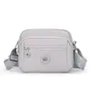 2026 Nova Bolsa Feminina de Cor Sólida Tendência Moda Cor Sólida Ombro Único Transversal Simples Bolsa Feminina de Nylon Casual Pequena Quadrada