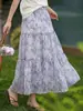 Falda Morada Floral Fresca y Romántica de Estilo Femenino para Mujer Primavera y Verano 2026 Nueva Versátil que Reduce la Edad Delgado Falda de Línea A