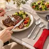 Set de cubiertos de acero inoxidable de tres piezas para Amazon, que incluye cuchillo para bistec, tenedor y cuchara, en una bolsa de tela creativa, adecuado para estudiantes y uso al aire libre