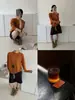 Outono 2026 Novo Suéter de Malha Feminino Top Estilo Coreano Elegante Cor Sólida Lã Pura Gola Redonda Manga Longa para Trabalho Casual Versátil