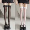 Medias negras hasta la rodilla con lazo de encaje para mujer, primavera y verano, ultra finas, transpirables, estilo JK, sexys, de tubo alto, de red