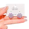 Pendientes de flor de cristal de circonita rosa y púrpura con diseño avanzado 2024, nuevos y elegantes pendientes de plata con broche de celebridad de Internet.