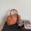 Bolsa Pequena Popular Retrô Feminina 2025 Nova Moda Versátil Bolsa Transversal Super Popular Bolsa Carteiro Bolsa Bowling
