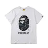 Comercio exterior al por mayor transfronterizo marca de tendencia estilo japonés camuflaje tiburón, cabeza de tigre, hombre-mono bloques de color luminoso manga corta corte holgado camiseta de pareja