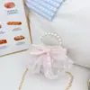 Elegante Bolso de Mano con Perlas para Niñas 2026 Nuevo Estilo Pequeño Estilo Chanel Monedero Infantil Bolso Cruzado Dulce con Lazo