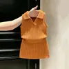 Conjunto de Tricô Fino Vazado de Verão para Meninas 2026 Novo Conjunto de Duas Peças com Colete e Saia para Bebê Menina Tendência