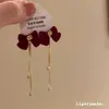 Pendientes rojos de Año Nuevo una cadena de campanillas de viento aterciopeladas pendientes de flor pendientes de mariposa Año Nuevo Chino boda borla pendientes de alta calidad mujer