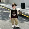 Conjunto de Ropa Otoño 2026 Primavera Otoño Nuevo Estilo Niños Versión Coreana Suéter Chaleco con Letra Conjunto de Tres Piezas Ropa de Moda