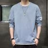 Camiseta Masculina Manga Longa Gola Redonda Marca da Moda Primavera e Outono Casual Versátil Falsa Peça Dupla Estilo Coreano Solta Moderna Cor Sólida Camiseta Básica