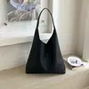 Bolso de mano tejido de lujo ligero de alta gama, nicho, para mujer, nuevo estilo 2026, moderno, popular de verano, para ir al trabajo, bolso de hombro único, tote