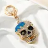 Llavero Creativo de Metal con Calavera de Halloween y Pedrería, Cabeza de Calavera Pequeña Simulada de Aleación, Estilo 3D Europeo y Americano