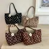 Bolso casual grande transfronterizo para mujer, nuevo bolso tote de lunares otoño 2026, bolso de hombro y axila de gran capacidad
