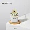 Adorno de artesanía en vidrio de Zibo, flor de nacimiento de diciembre, planta verde floral de vidrio artificial, decoración de escritorio, regalo creativo