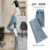 Pantalones acampanados con borde de pelo de color claro para mujer, cintura alta, adelgazantes, con borlas pequeñas, estilo mopa, jeans para primavera y otoño 2024