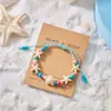Moda de verano pulsera tejida con cuentas pequeñas y frescas pulsera creativa versátil de cuentas de arroz de playa con estrella de mar para mujer en stock al por mayor