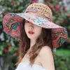 Novo Chapéu de Palha Feminino de Aba Larga Estilo Étnico de Férias Chapéu com Proteção Solar Sombra Estampado Versátil Trançado Chapéu de Sol de Praia