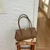 Bolsa de Mão Retro Europeia e Americana Shuai Mi Jia para Mulheres, Nova Bolsa de Ombro Minimalista Estilo Retro 2026 para o Dia a Dia, Bolsa de Braço de Luxo Leve