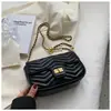 Moda primavera y verano bolso bandolera para mujer 2022 nuevo de este año popular bolso de cadena de rombos con cierre de hebilla bolso cuadrado pequeño generación pelo