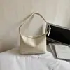 Bolsa de Braço para Mulheres 2026 Nova Tendência de Moda Primavera Bolsa de Ombro Exquisita para Trabalho Deslocamento Bolsa Transversal Balde