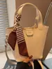 Bolsa Pequena para Mãe de Verão Feminina 2025 Nova Moda Bolsinha Feminina Casual Bolsinha de Ombro Estilo Western Bolsinha Transversal de Balde