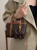 Bolsa de Lujo Ligero de Nicho Nueva Otoño 2025 para Mujer Bolso Cubo de Mano Retro Bolso de Hombro Cruzado de Moda Tendencia