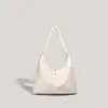 Bolsa de Ombro Casual Nova 2025 Cor Lisa de Nicho Grande Capacidade Bolsa de Axila para o Dia a Dia Bolsa de Ombro Crescente