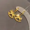 ¡Super Elegante! Pendientes Mecedora de Hielo Triturado Dorado Únicos para Mujer, Pendientes de Moda para el Año del Caballo, Accesorios de Año Nuevo
