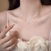 Collar con lazo de lujo ligero y de alta gama para mujer, estilo Ins, elegante y a la moda, con diseño que combina con todo, con cadena de clavícula de nicho.