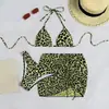 Traje de baño de dos piezas con estampado de leopardo y amarre, estilo europeo y americano, nuevo para 2026, un conjunto de bikini sexy de tres piezas