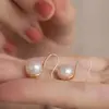Estilo Igual do TikTok [Saltos Altos] Brincos de Pérola com Luz Forte Temperamento Feminino Design de Nicho Brincos de Cobre Dourado de Alta Qualidade