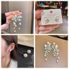 Pendientes de flor de campana de orquídea con perla de nicho para mujer, elegantes pendientes largos con borlas de Corea del Sur, con un diseño dulce que combina con todo.
