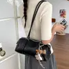 Bolsa de Mão Retrô Transfronteiriça com Toque de Luxo para o Trabalho para Mulheres Outono 2026 Nova Bolsa de Ombro Versátil Bolsa Almofada