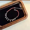 Pulsera de Hilo Rojo con Monedas de Cinco Emperadores Estilo Chino Nuevo Dorado para Mujer, Exquisito Accesorio de Mano Versátil que Atrae la Riqueza para Año Nuevo