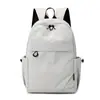 Mochila de Nylon Cor Sólida Estilo Minimalista Japonês Estilo Casal Viagem Sensação Relaxada Armazenamento Versátil Mochila Casual de Viagem