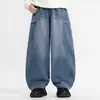 Jeans para niños 2026 primavera y otoño nuevo estilo unisex casual pantalones largos de moda corte holgado para niños mayores pantalones de pierna curva