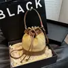 Bolsas de Mujer Transfronterizas 2026 Nuevo Primavera Versátil Tejida de Hombro Cruzada Bolso de Mano de Moda Bolso Cubo Texturizado