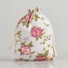 Fábrica en stock al por mayor bolsa de embalaje para joyería de algodón y lino bolsa sachet sachet con patrón de impresión de flor seca carbón activado bolsa vacía