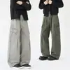 Ropa de Hombre Xintang Primavera Nuevo Estilo Casual Ropa de Trabajo Pantalones de Bolsillo Grande Algodón Puro Semi-Elástico Cinturón de Botón Pantalones Largos Versátiles