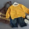 Camiseta base de otoño para niños Muye, camiseta de rayas estilo coreano, ropa infantil Huzhou Zhili, top elegante dos en uno para niños