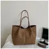 Bolso tote de tela cepillada transfronterizo para mujer, nuevo modelo 2026, bolso de hombro o axila de nicho vintage de alta calidad